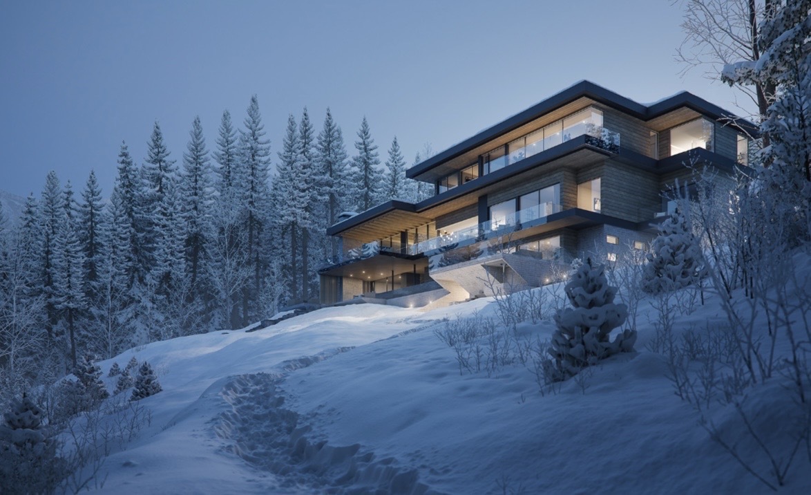 Apex 51 lodge at dusk, lit windows above a snow-covered slope in Revelstoke